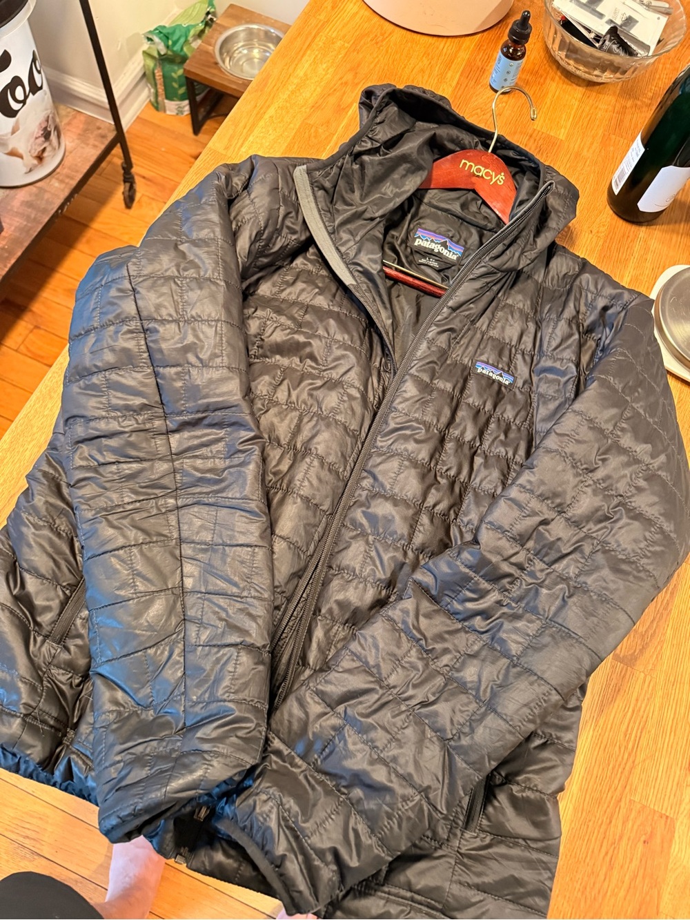 Patagonia Men’s Black Nano Puff Hooded jacket. Size L